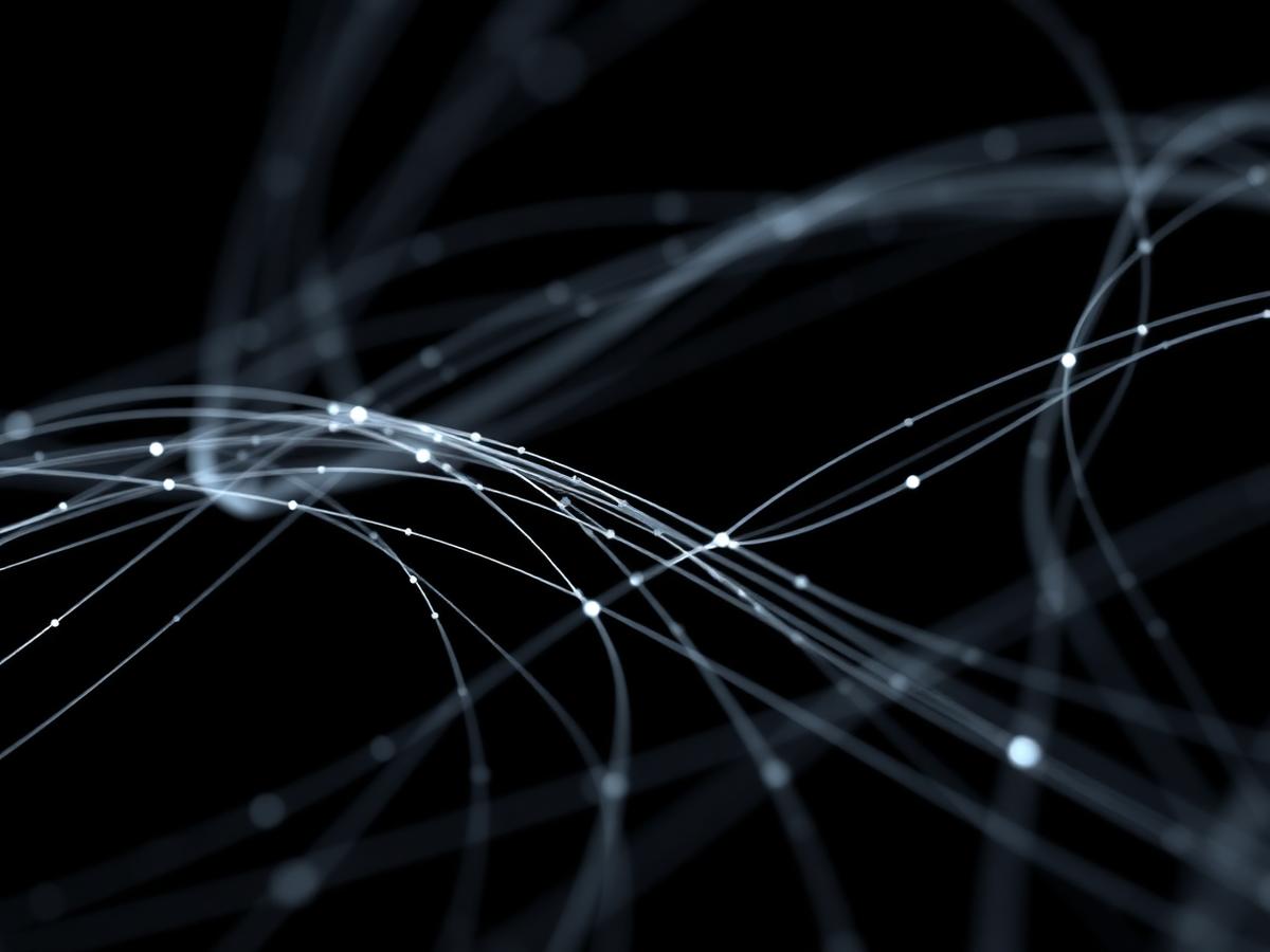 Abstract fiber-optic silver threads representing AI automation networks